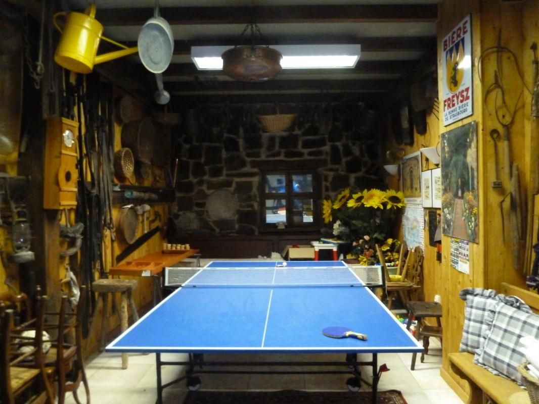 Salle de jeux
avec babyfoot et skoelbag